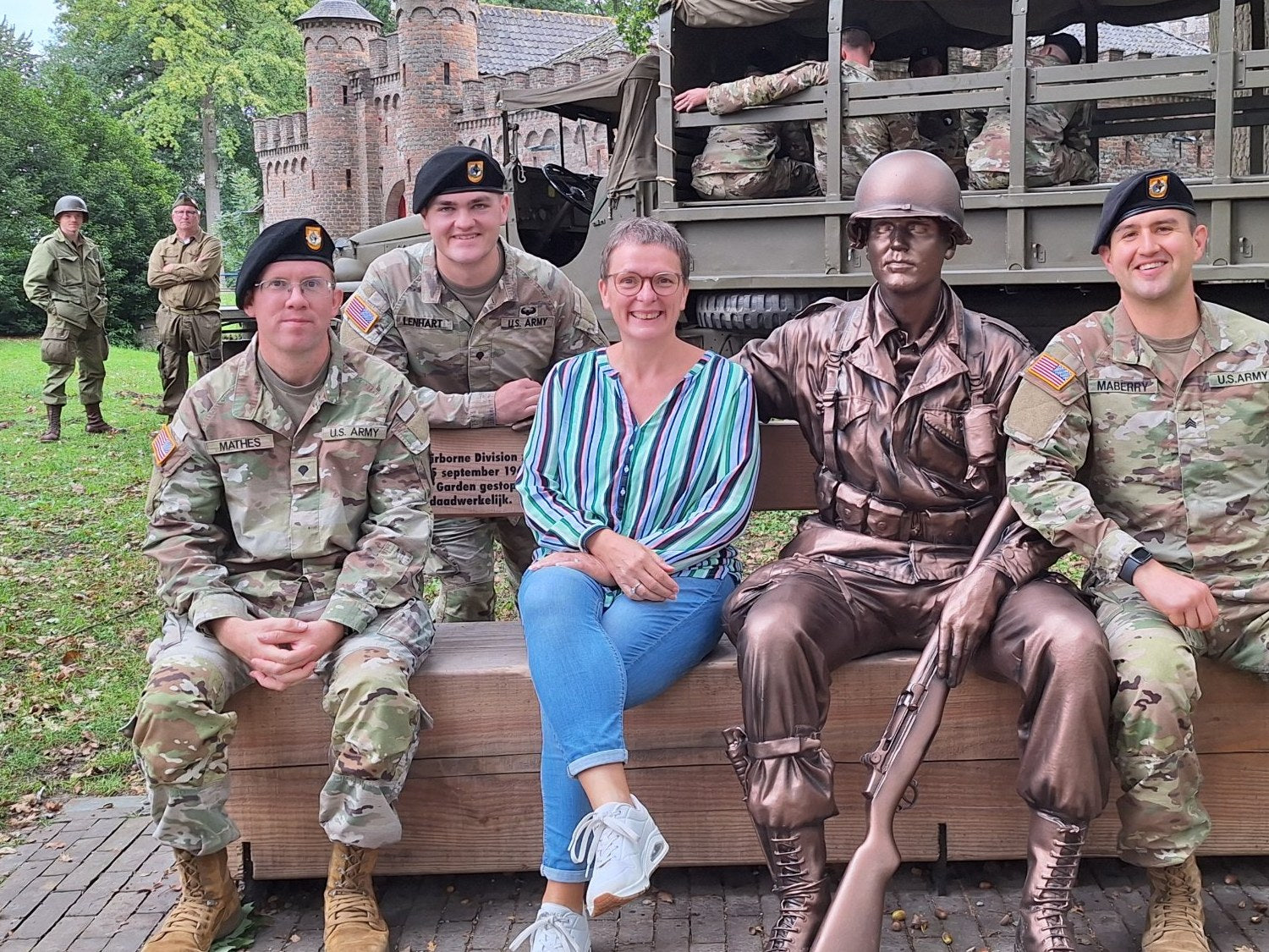 Hetty van den Tillaart with soldiers of the 101st on convoy day