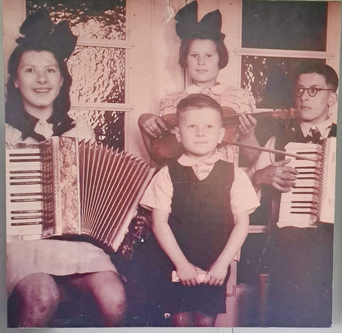 A family making music with accordions